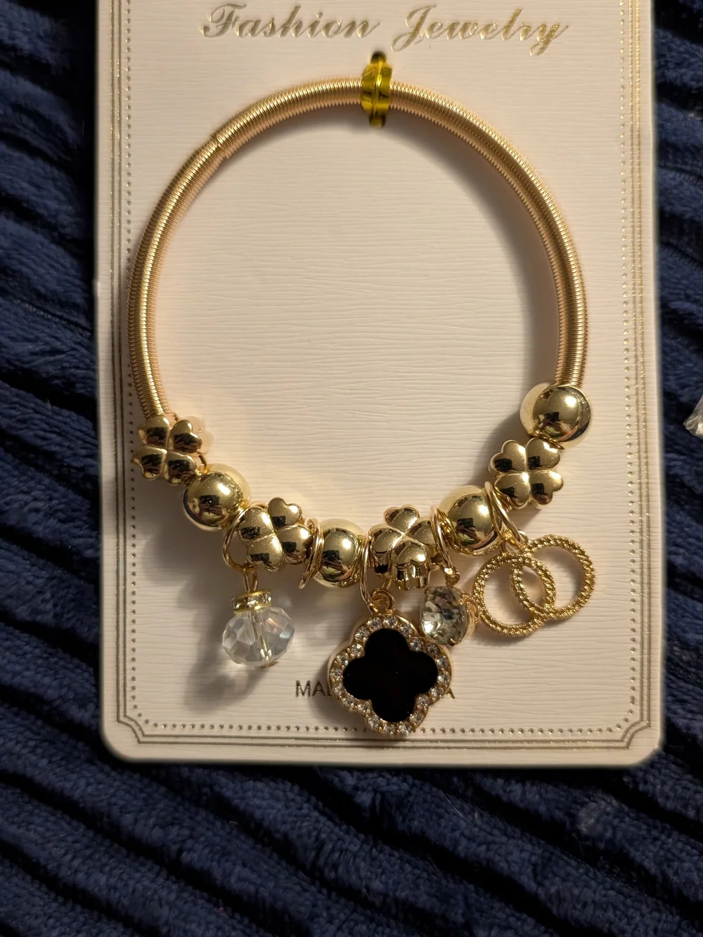 Gold Charm Bracelet with Black Clover Pendant